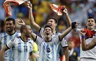 Argentina's forward and captain Lionel Messi (C) celebrates with teammates after winning the quarter-final football match between Argentina and Belgium at the Mane Garrincha National Stadium in Brasilia during the 2014 FIFA World Cup on July 5, 2014. AFP