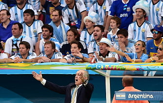 Argentina's coach Alejandro Sabella (bottom C) reacts during the second half of a quarter-final football match between Argentina and Belgium at the Mane Garrincha National Stadium in Brasilia during the 2014 FIFA World Cup on July 5, 2014. AFP
