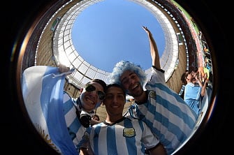 Fans of Argentina pose prior to a quarter-final football match between Argentina and Belgium at the Mane Garrincha National Stadium in Brasilia during the 2014 FIFA World Cup on July 5, 2014. AFP