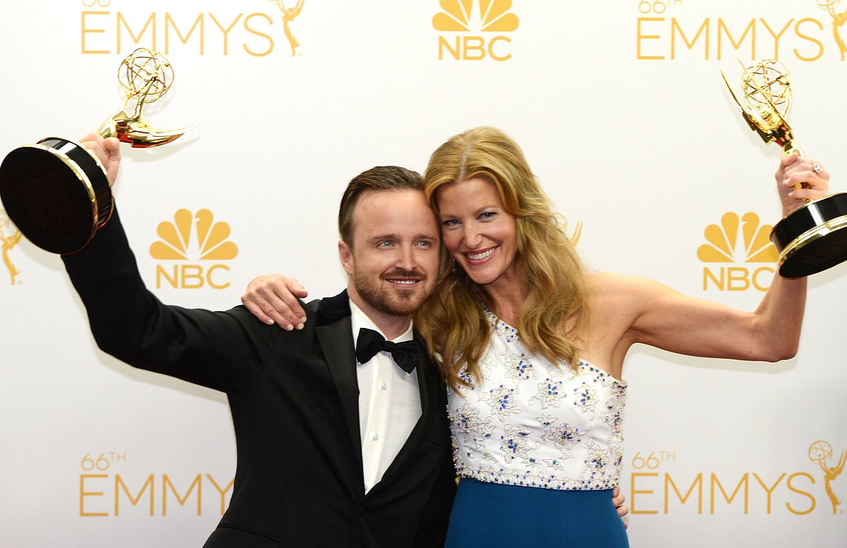 Actor Aaron Paul (L) and actress Anna Gunn pose in the pressroom after winning Outstanding Drama Series Award. Photo: AFP
