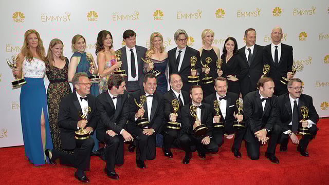 Cast and crew pose in the pressroom after winning the Outstanding Drama Series Award, Outstanding Lead Actor in a Drama Series Award, Outstanding Supporting Actor in a Drama Series Award and Outstanding Supporting Actress in a Drama Series for 'Breaking Bad'. Photo: AFP
