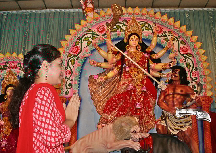 The Durga Puja, biggest religious festival of the Hindus, began on Tuesday with the incarnation of the Goddess Durga on the Shashthi at temples across the country and a mood of festivities persists among the devotees irrespective of ages marking the festival. Photo: Focus Bangla