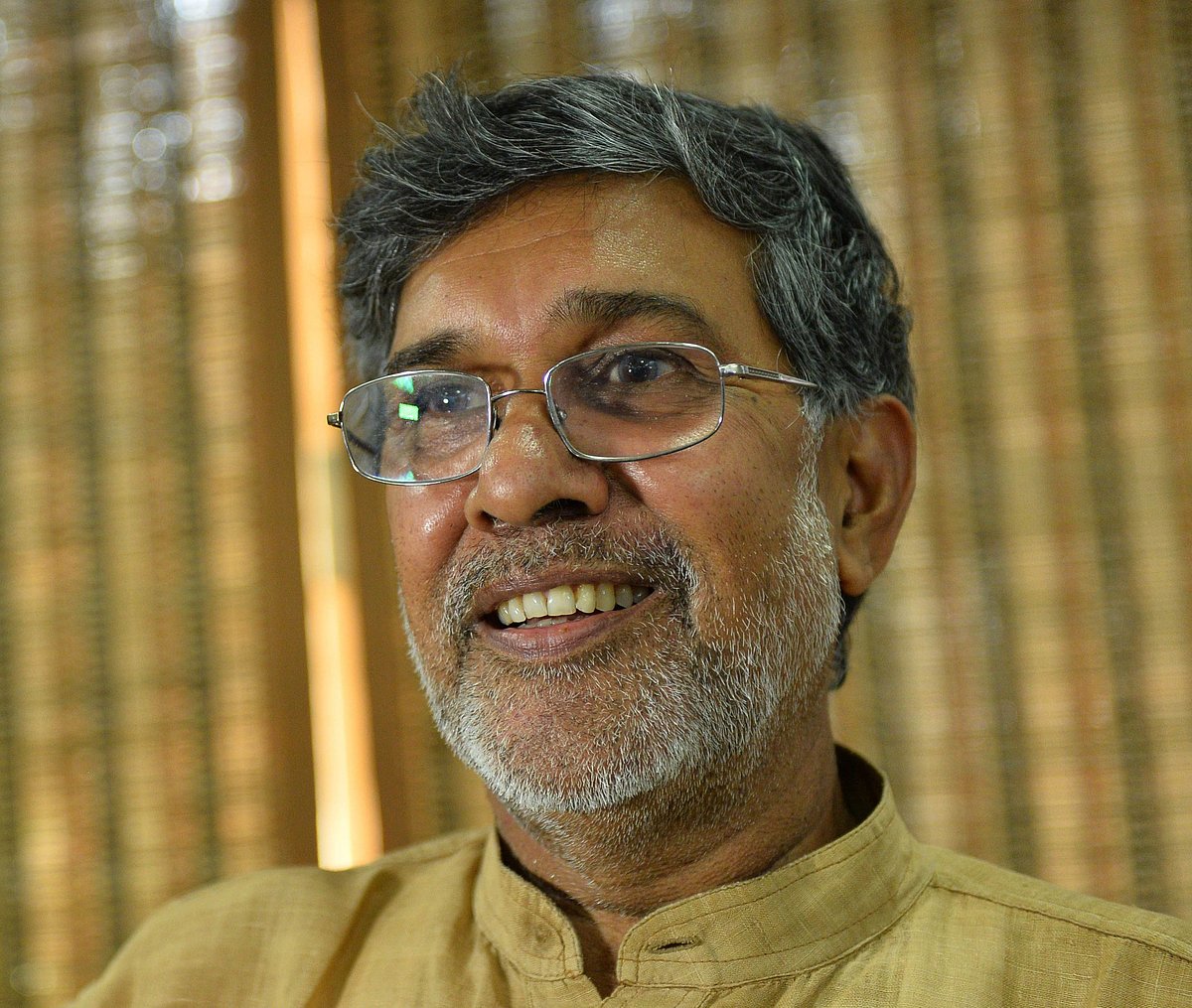 Indian activist Kailash Satyarthi interacts with journalists at this home office after the announcement of him receiving the Nobel Peace Prize, in New Delhi on October 10, 2014. AFP