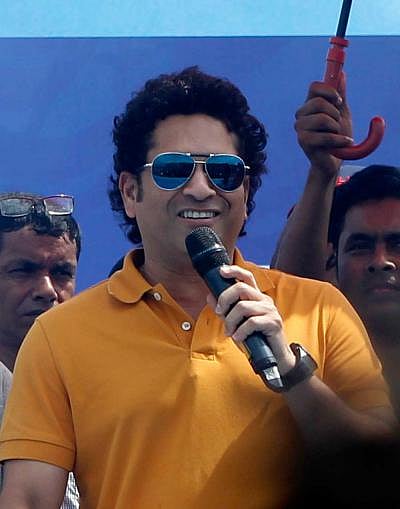 Sachin unveils logo of ‘Legends of Rupganj’ cricket club at Narayanganj on Tuesday. Photo: Shamsul Haque