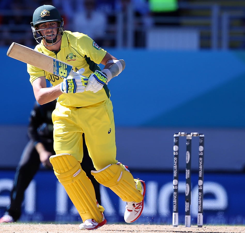 Australia's Pat Cummins plays a shot during their match against New Zealand on 28 February 2015. Photo: AFP
