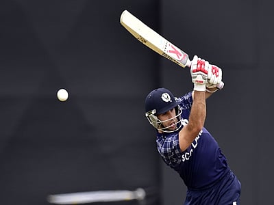 Scotland batsman Kyle Coetzer plays a shot during their match against Bangladesh.AFP