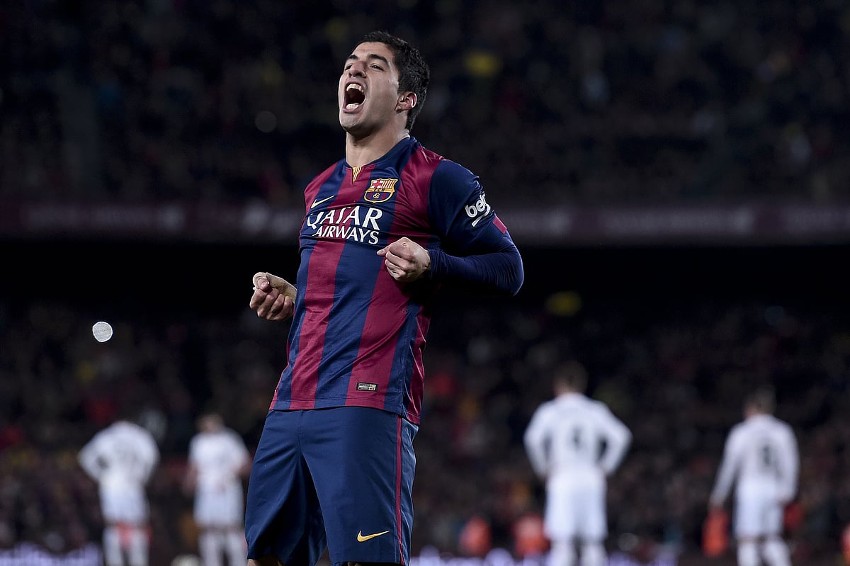 Barcelona's Uruguayan forward Luis Suarez celebrates his goal during their match against Real Madrid at the Camp Nou stadium in Barcelona on 22 March 2015. Photo: AFP