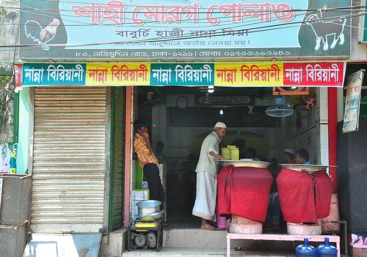 Restaurants workers are busy to package Biriyani at flagship shop of Nanna Biriyani restaurant at Becharamdewri of Old Dhaka on 23 March. Photo: Abdus Salam
