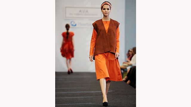 A model presents creations by Belarusian designer Julia Gilevich during the Belarus Fashion Council in Minsk on April 24, 2015. Photo: AFP