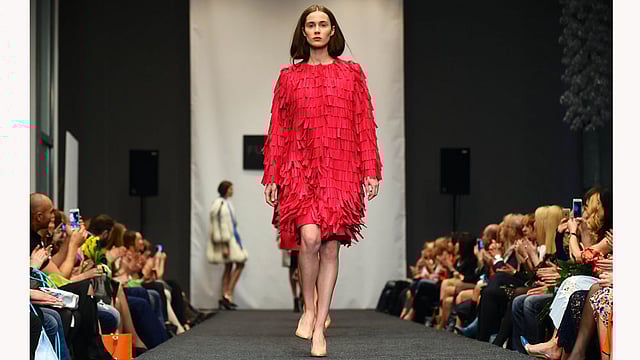 A model presents creations by Belarusian designer Julia Gilevich during the Belarus Fashion Council in Minsk on April 24, 2015. Photo: AFP