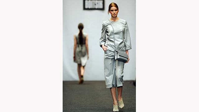 A model presents creations by Belarusian designer Julia Gilevich during the Belarus Fashion Council in Minsk on April 24, 2015. Photo: AFP