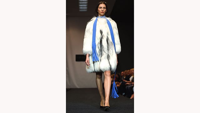 A model presents creations by Belarusian designer Julia Gilevich during the Belarus Fashion Council in Minsk on April 24, 2015. Photo: AFP