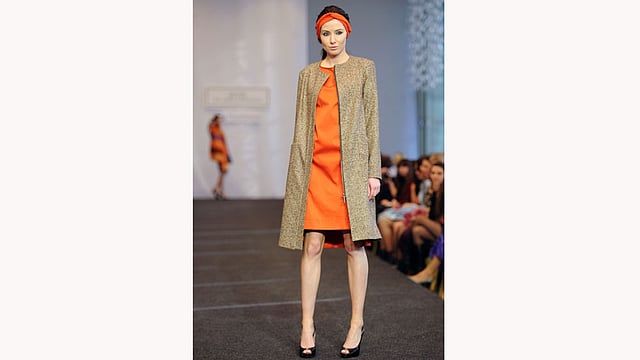 A model presents creations by Belarusian designer Julia Gilevich during the Belarus Fashion Council in Minsk on April 24, 2015. Photo: AFP