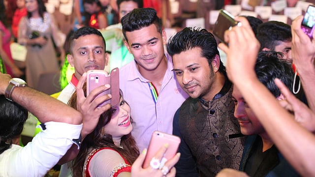 Cricketer Taskin, actors Nirob and Emon are pictured while taking selfie at Meril-Prothom Alo award reception programme at Bangabandhu International Conference Centre on 08 May 2015. Photo: Monirul Alam