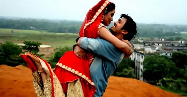 Shuvo with co-star Momo in a scene of Chhuye Dile Mon