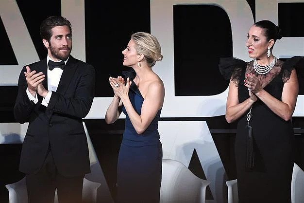 British actress Sienna Miller and Spanish actress Rossy de Palma applaud during the opening ceremony of the 68th Cannes Film Festival. Photo: AFP