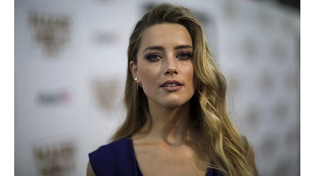 Cast member Amber Heard poses at the premiere of Magic Mike in Hollywood, California, June 25, 2015.