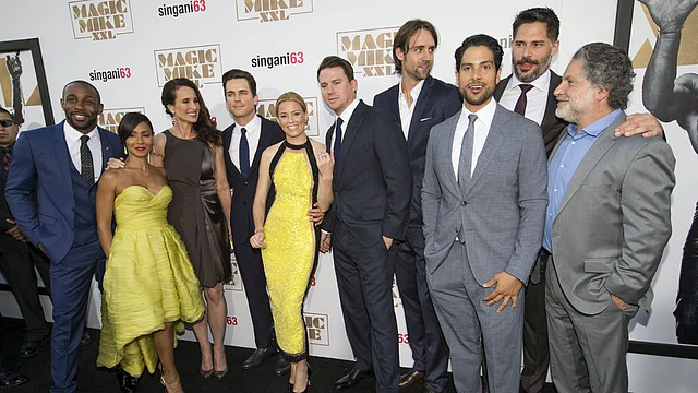 Director of the movie Gregory Jacobs (R), writer of the movie Reid Carolin (4th from R) pose with cast members (from -R) Stephen Boss, Jada Pinkett Smith, Andie MacDowell, Matt Bomer, Elizabeth Banks, Chnning Tatum, Adam Rodriguez and Joe Manganiello at the premiere of Magic Mike XXL