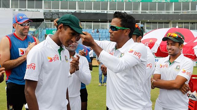 1	Pacer Rubel Hossain gives Mustafizur Rahman Test cap in first Test against South Africa at Chittagong. Photo: Shamsul Haque