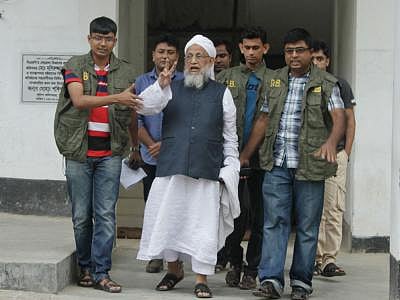 The Detective Branch (DB) of police detains Mufti Izahar president of a faction of the Islami Oikkya Jote in Chittagong on Friday.