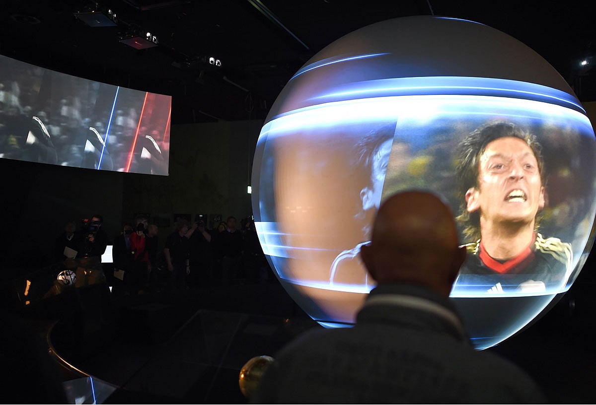 A huge TV screen in a shape of a ball is on display inside the new German Football Museum in Dortmund, western Germany on October 19, 2015. AFP