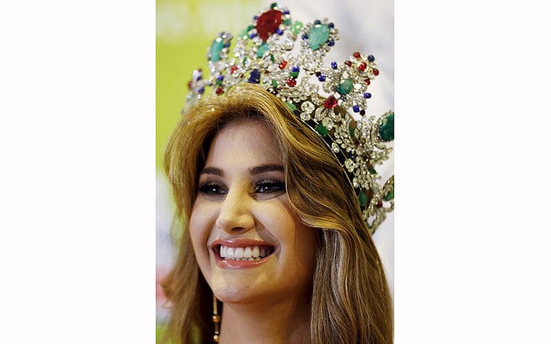 Miss Venezuela 2015 Mariam Habach smiles during a news conference in Caracas October 9, 2015.