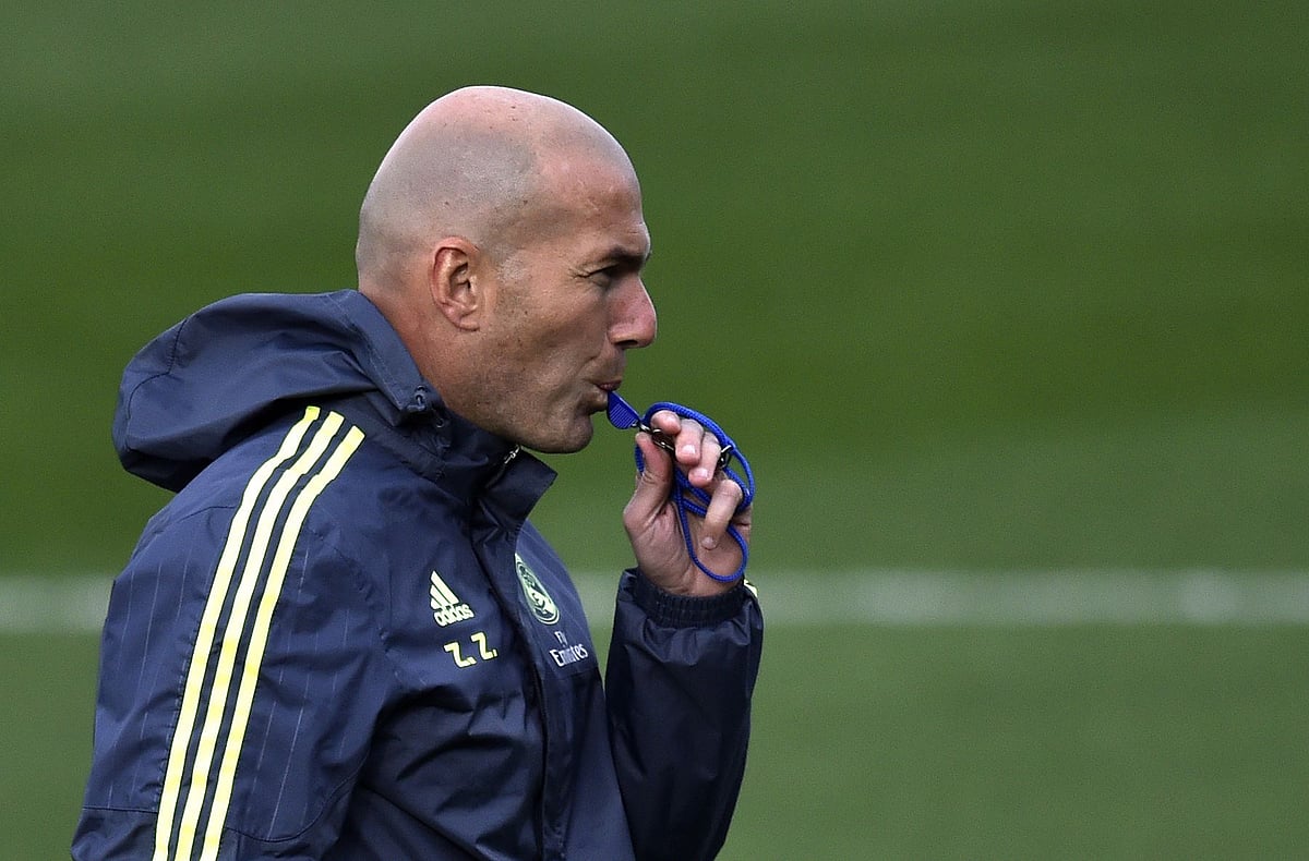 Real Madrid`s new French coach Zinedine Zidane blows the whistle during a training session. Photo: AFP