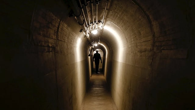 A tunnel connects the bunkers at a former Swiss Army artillery fort in Faulensee, Switzerland October 19, 2015. Photo: Reuters