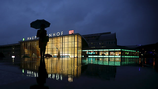 A woman walks in front of the main railway station in Cologne, Germany January 7, 2016, near the city`s cathedral. Photo: Reuters