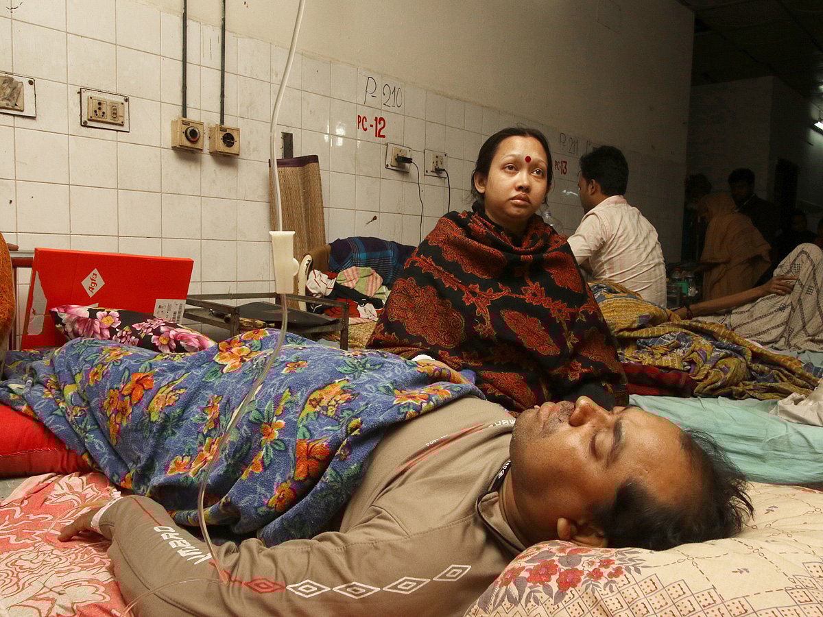 DSCC official Bikash Chandra Das receives treatment at Dhaka Medical College Hospital after policemen assault him in Jatrabari area of Dhaka on early Friday. The photo has been taken at around 3:00pm on Friday by Abdus Salam.