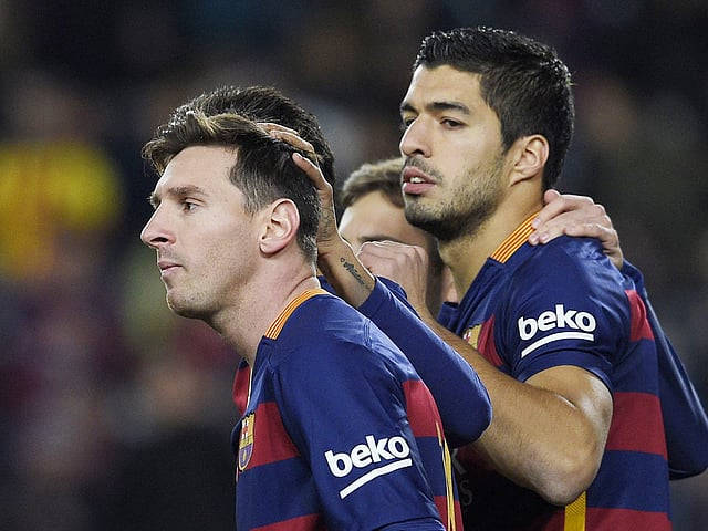 Messi-Suarez. AFP
