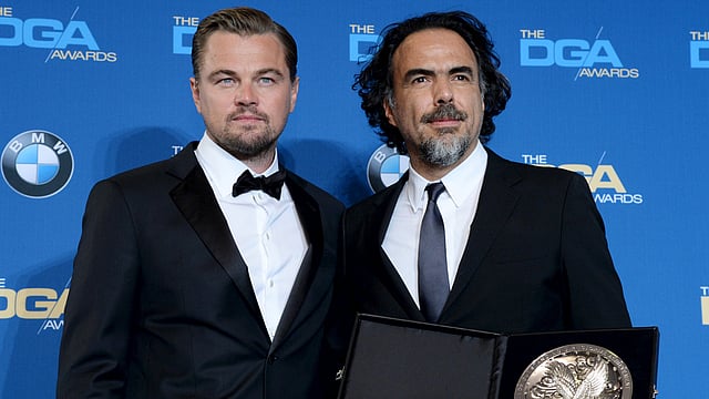Leonardo DiCaprio (L) presents the Feature Film Nomination to Alejandro G. Inarritu during the 68th annual DGA Awards in Los Angeles February 6, 2016. Photo: Reuters