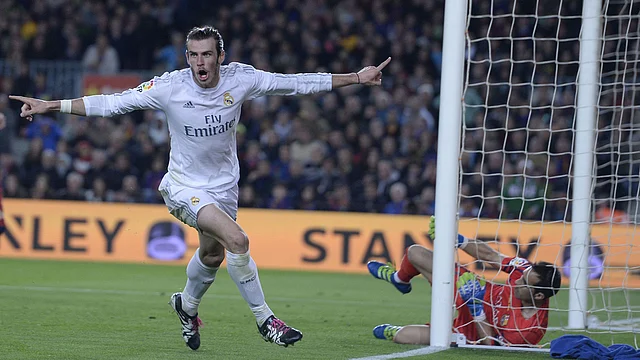 Real Madrid`s Welsh forward Gareth Bale celebrates his disallowed goal during the Spanish league `Clasico` football match FC Barcelona vs Real Madrid CF at the Camp Nou stadium in Barcelona on April 2, 2016. AFP