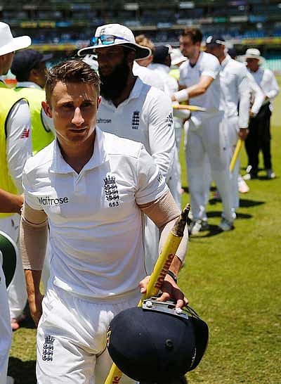 This file photo taken on 30 December, 2015 shows England player James Taylor (front) and other team members leaving the grounds at the end of the first Test match between South Africa and England at Kingsmead Stadium in Durban. Photo: AFP