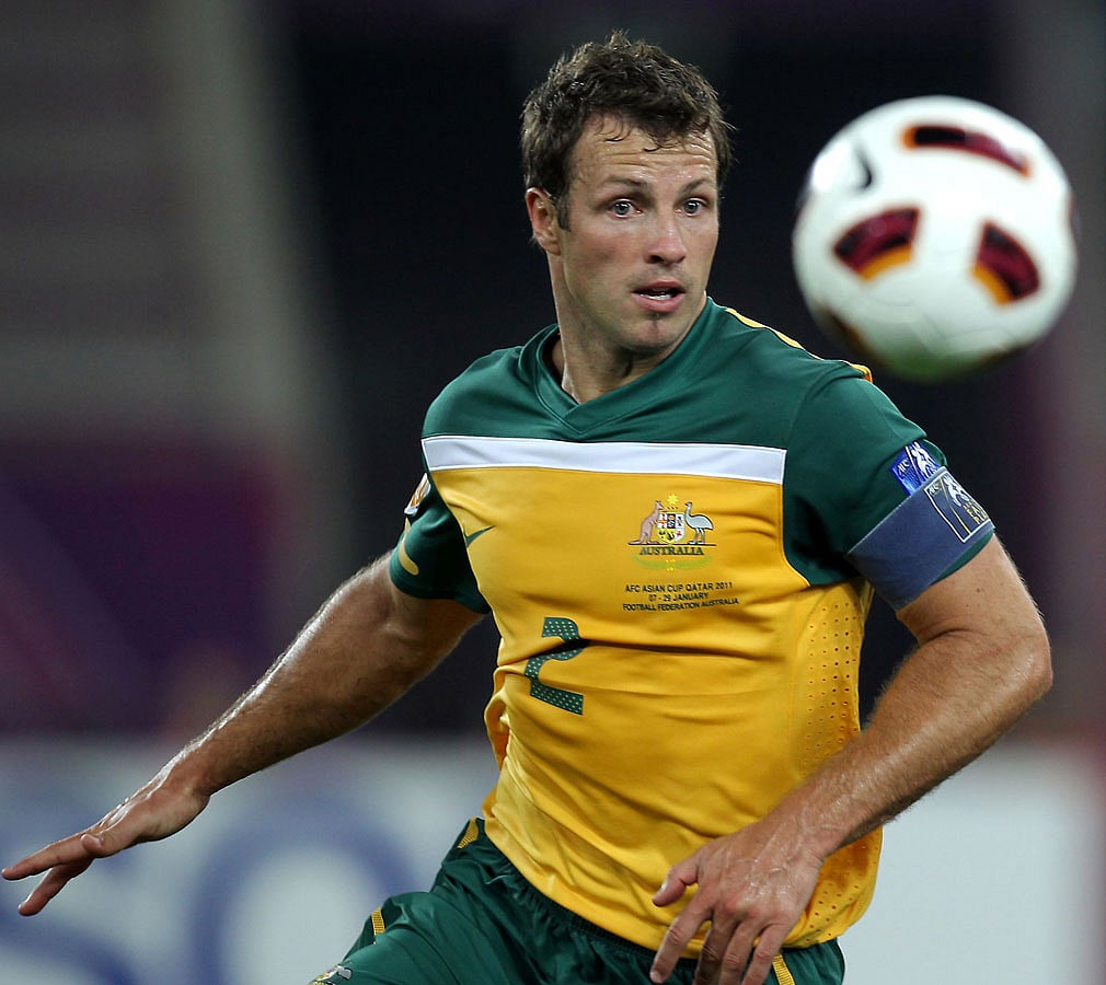 A file photo taken on 29 January, 2011, shows Australia`s defender Lucas Neill controlling the ball during the 2011 Asian Cup final football match between Australia and Japan at Khalifa Stadium in the Qatari capital Doha. Photo: AFP