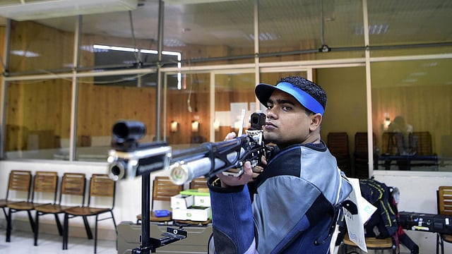 This photograph taken on on May 25, 2016 shows Bangladeshi shooter Abdullah Hel Baki preparing for his practice at a shooting complex in Dhaka. AFP