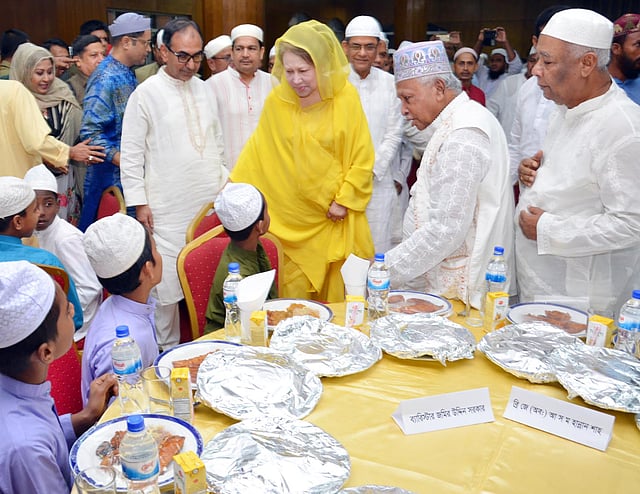 BNP chief Khaleda Zia enquires after the orphans at the iftar party. Photo: BNP