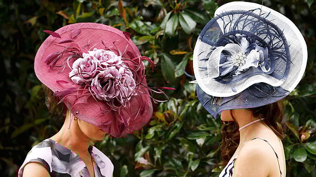 Ladies Day Racegoers wear hats. Photo: Reuters