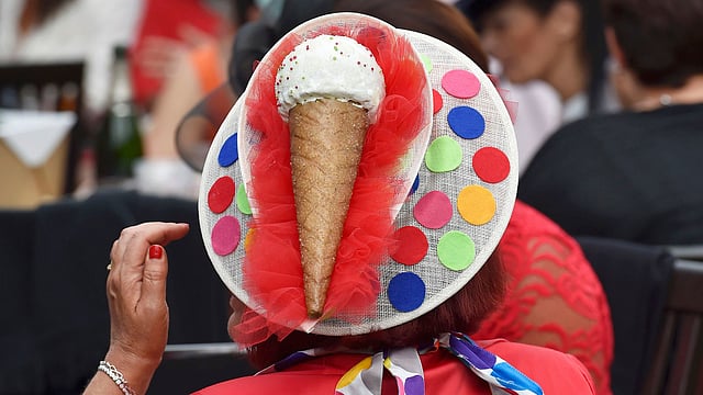 Ladies Day Racegoer wears hat. Photo: Reuters