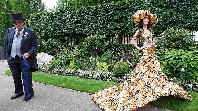 Ladies Day Racegoer wears hat. Photo: Reuters