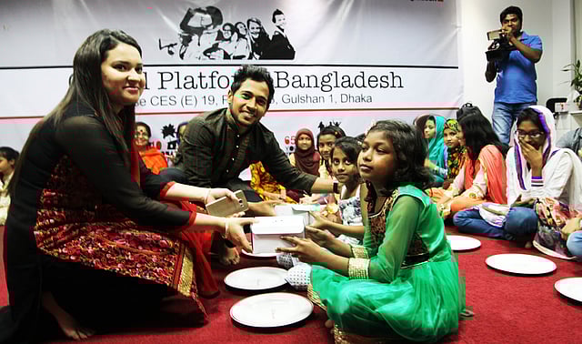 Bangladesh's test cricket captain Mushfiqur Rahim takes part at an iftar with a groups of unprivileged children on 25 June.