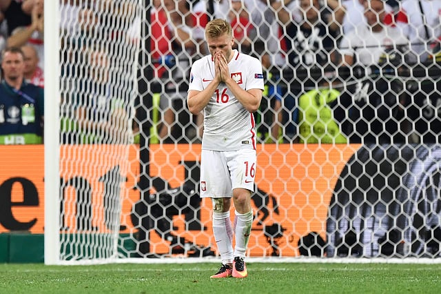 Poland midfielder Jakub Blaszczykowski reacts after missing a penalty in the shoot-out during the Euro 2016 quarter-final against Portugal at the Stade Velodrome in Marseille on Thursday. Photo: AFP