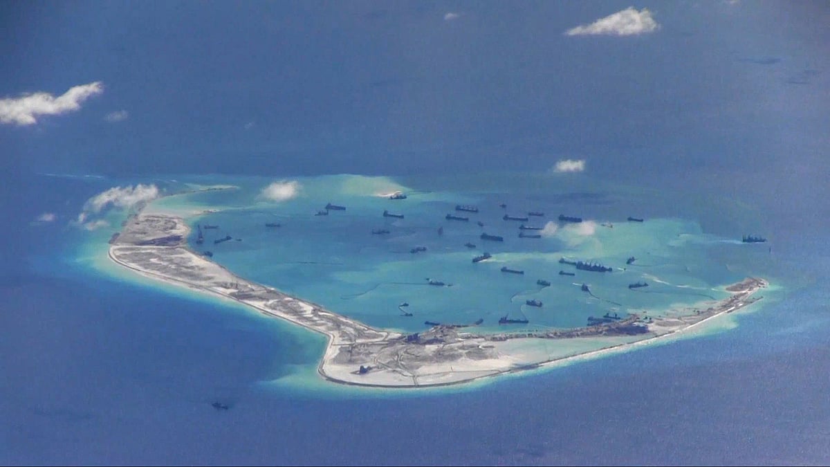 Still image from United States Navy video purportedly shows Chinese dredging vessels in the waters around Mischief Reef in the disputed Spratly Islands. Photo: Reuters