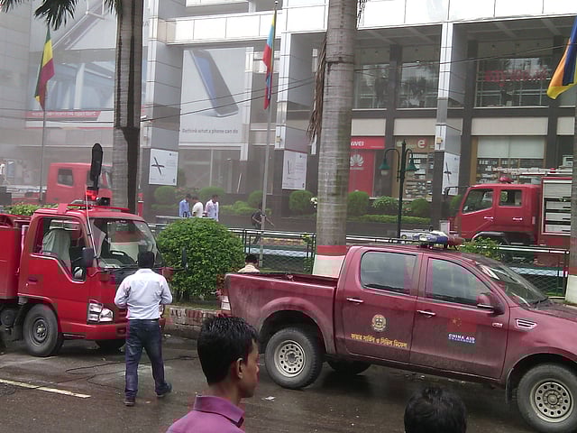 Fire service and civil defence are trying to douse the flame at the Basundhara City shopping mall on 21 August, 2016. Photo: Toriqul Islam