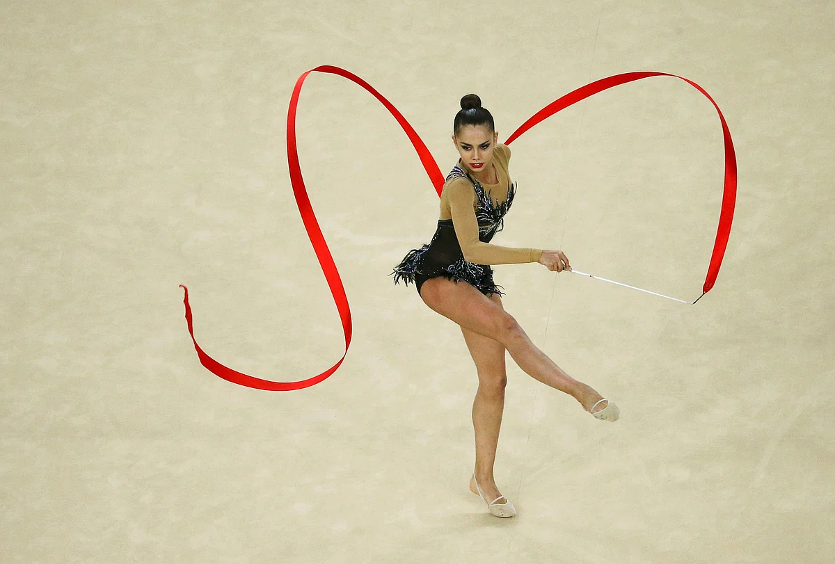 Mamun (RUS) of Russia competes using the ribbon. REUTERS