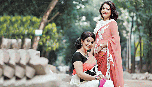 Actress Kumkum Hossain and Biman employee Marufa Mahfuz. Photo: Kabir Hossain Wardrobe: Almira by Shahrukh Amin Makeup: Divine Beauty lounge Location: Khazana Restaurant