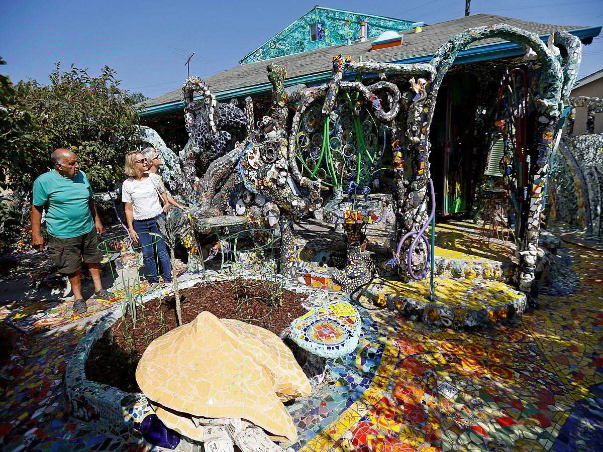 Artist Gonzalo Duran conducts a tour of the Mosaic Tile House created by artist Cheri Pann and himself in Venice, California. Photo:  Reuters