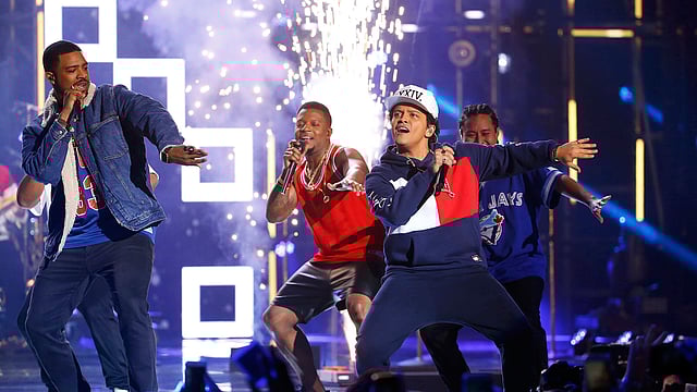 Bruno Mars (2nd R) performs on stage at the 2016 MTV Europe Music Awards at the Ahoy Arena in Rotterdam, Netherlands. Photo: Reuters