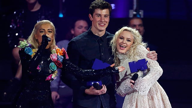 Shawn Mendes and Zara Larsson pose with their trophies on stage at the 2016 MTV Europe Music Awards at the Ahoy Arena in Rotterdam. Photo: Reuters