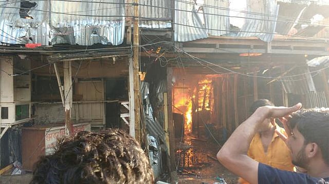 A fire broke out at Korail slum in the city on Sunday afternoon. Photo: Ahmed Zaif